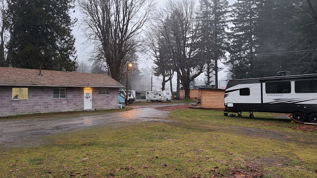 park with campers and wet street